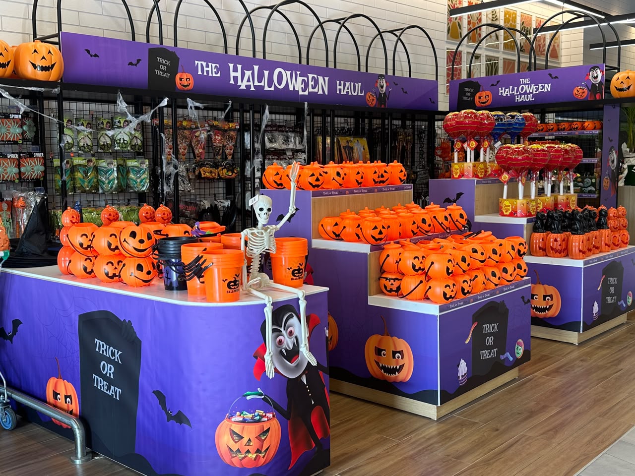 Halloween pumpkin buckets and decorations on display at Choithrams