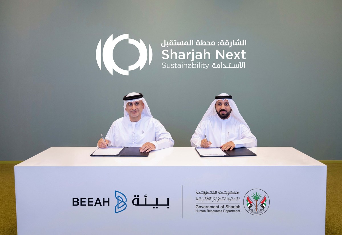 H.E. Abdullah Ibrahim Al Zaabi and Khaled Al Huraimel at the signing
