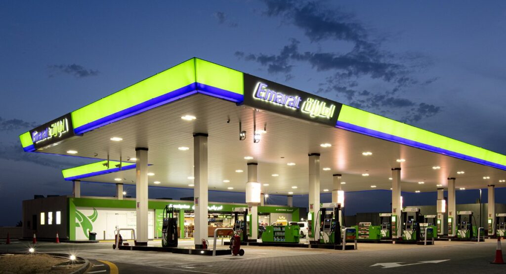 An Emarat petrol station in Dubai at dusk