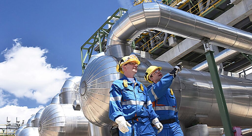 Workers at a gas processing facility