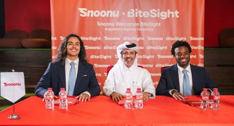 Snoonu and BiteSight executives at the acquisition signing ceremony